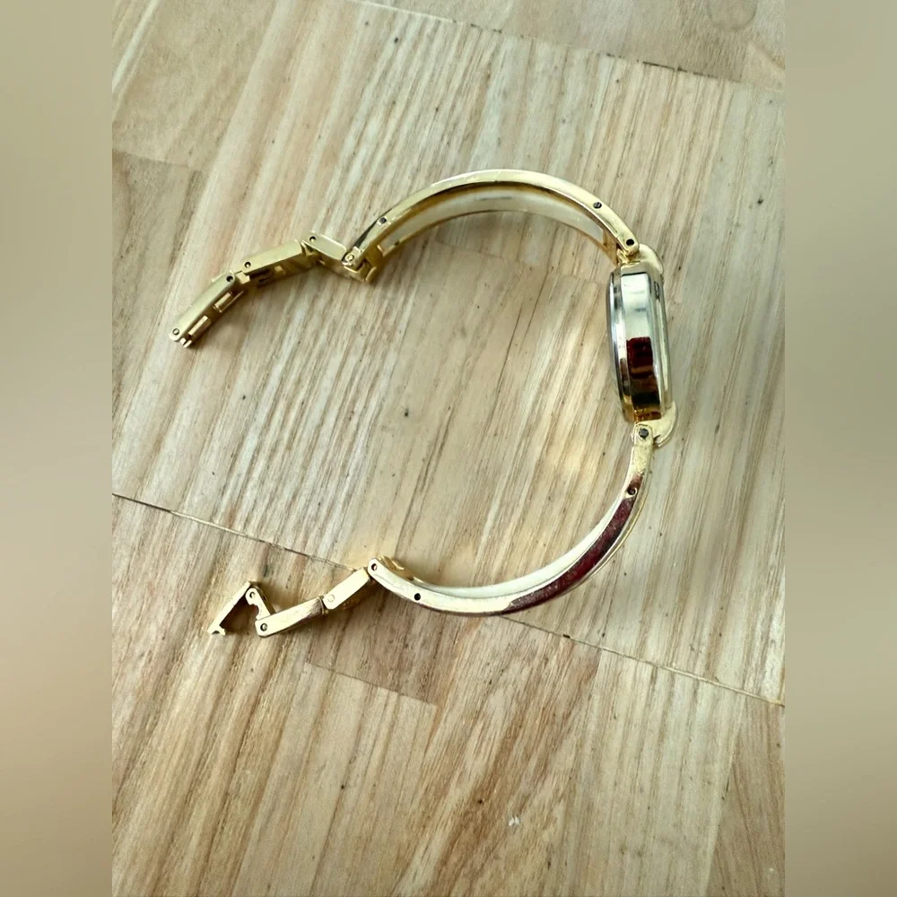 Rumours ladies gold tone watch NEW BATTERY